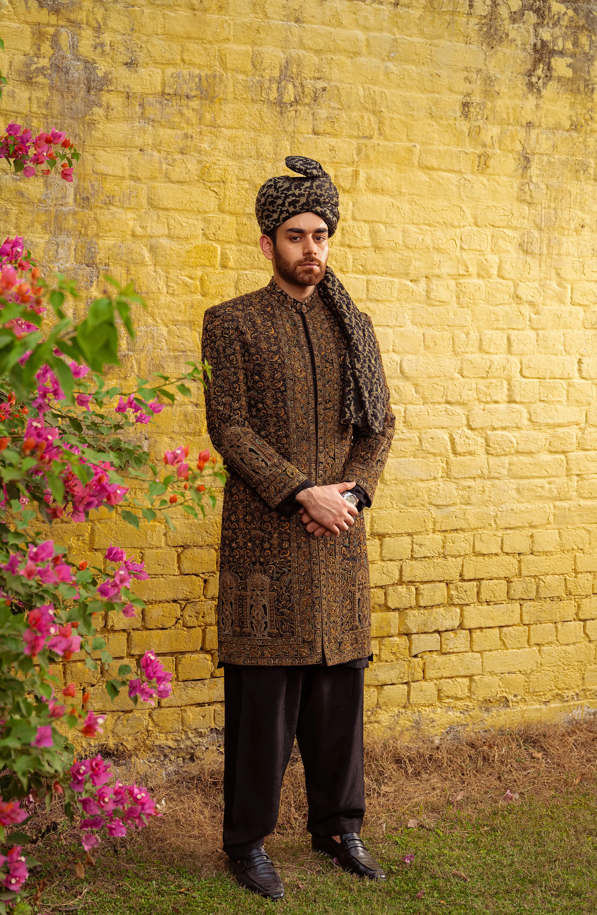 Dastaan - Exquisite Black Silk Sherwani adorned with Antique Gold, Teal & Beige Embroidery