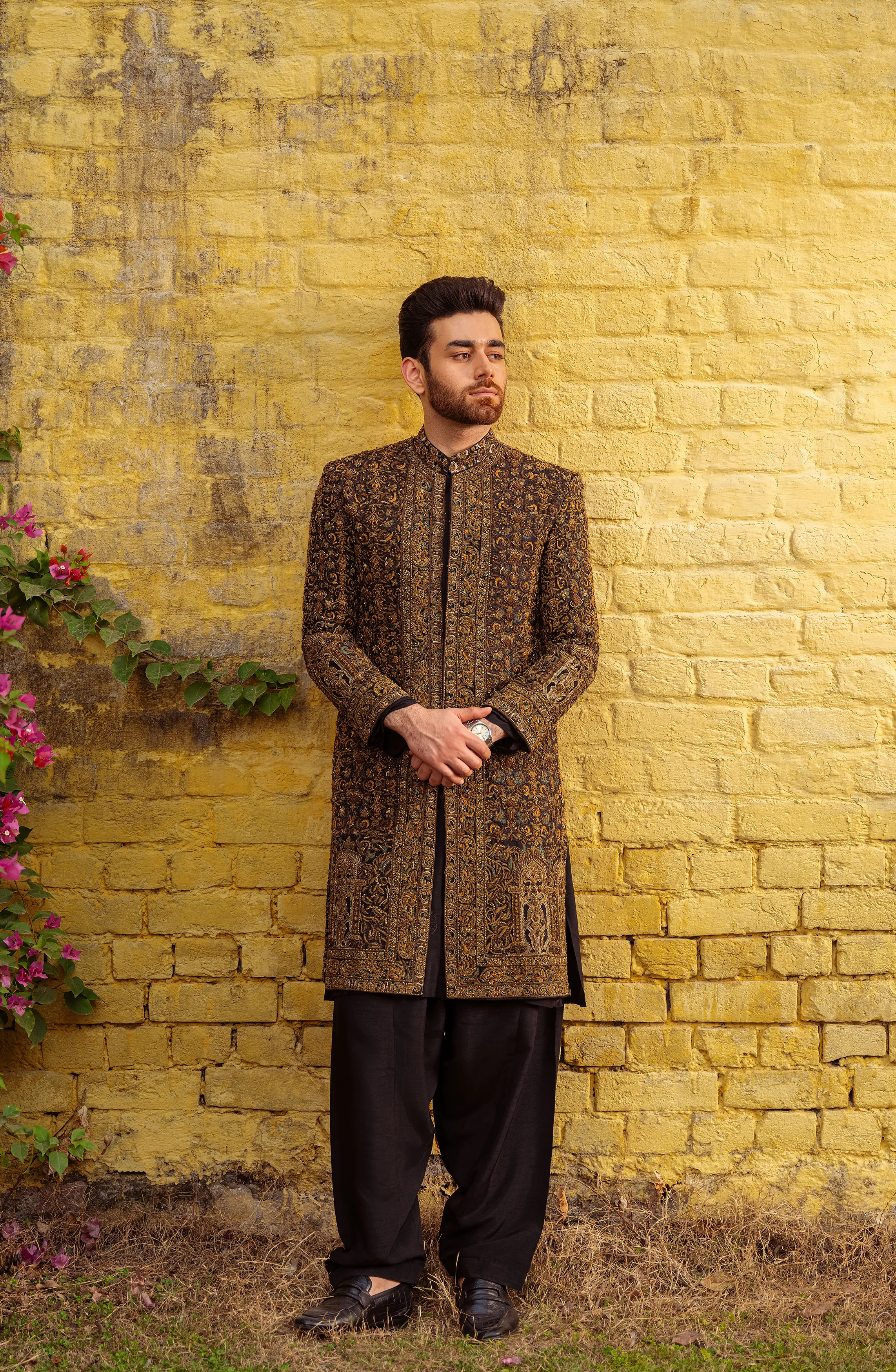 Dastaan - Exquisite Black Silk Sherwani adorned with Antique Gold, Teal & Beige Embroidery